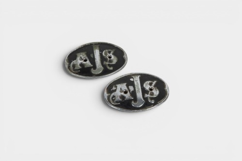 AJS: A pair of rare c1952 AJS fuel tank badges [Location: Melbourne]