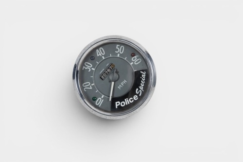 SMITHS: A Smiths 60 MPH speedometer with trip counter, face marked 'Police Special', lens width 11.5cm [Location: Melbourne]