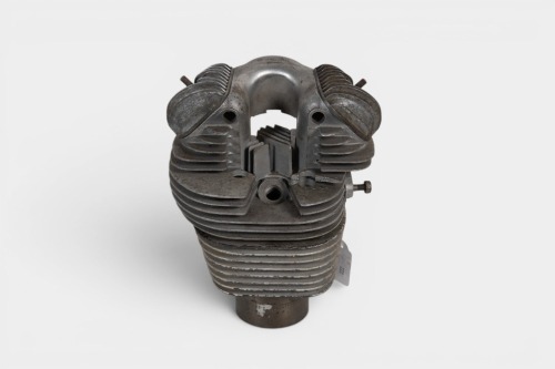 TRIUMPH: A Triumph late model Mountain Cub cylinder head & barrel, with valves & valve covers