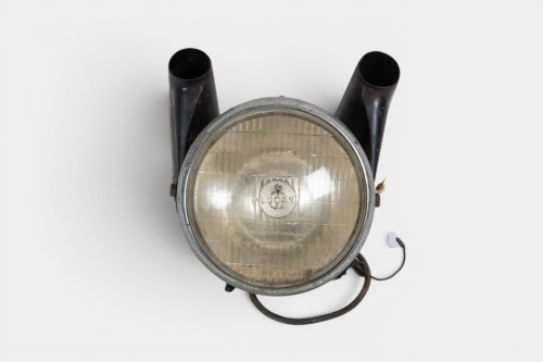 NORTON: A c1968 Norton Atlas headlight (Lucas 700 lens) with mounts and ammeter gauge