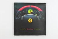 PILOTA FERRARI: A 2004 Pilota Ferrari kit containing brochures for various Ferrari driving courses