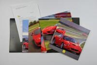 PILOTA FERRARI: A 2004 Pilota Ferrari kit containing brochures for various Ferrari driving courses - 2