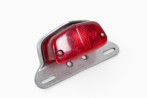 BSA / TRIUMPH: A c1960s BSA or Triumph tail lamp with plate holder [Location: Melbourne]