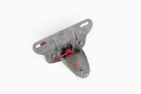 BSA / TRIUMPH: A c1960s BSA or Triumph tail lamp with plate holder [Location: Melbourne] - 2