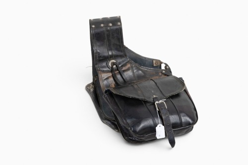 SADDLE BAG: A leather throw-over saddle bag [Location: Melbourne]