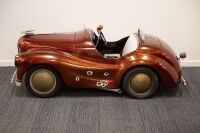 A 1950s steel bodied Austin J40 pedal car in hot rodded livery [Location: Melbourne] - 4