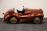 A 1950s steel bodied Austin J40 pedal car in hot rodded livery [Location: Melbourne] - 6