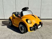 VOLKSWAGEN: An electric kids ride-on Volkswagen Beetle, 94cm length [Location: Sydney]