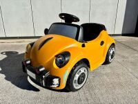 VOLKSWAGEN: An electric kids ride-on Volkswagen Beetle, 94cm length [Location: Sydney] - 2