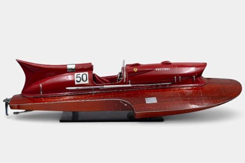 A modern, detailed model of the 1951 Timossi-Ferrari racing hydroplane Arno XI on stand, 21cm high, 91cm wide, 38cm deep [Location: Melbourne]