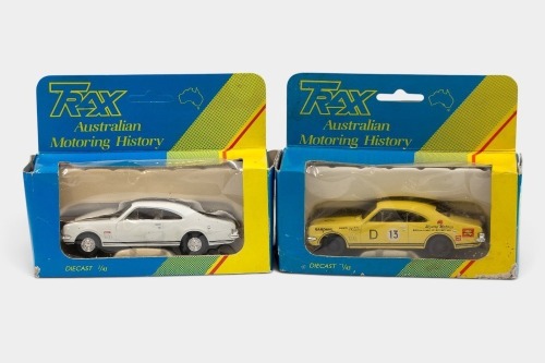140 · HOLDEN MONARO: Two 1:43 scale Trax Holden HK Monaros