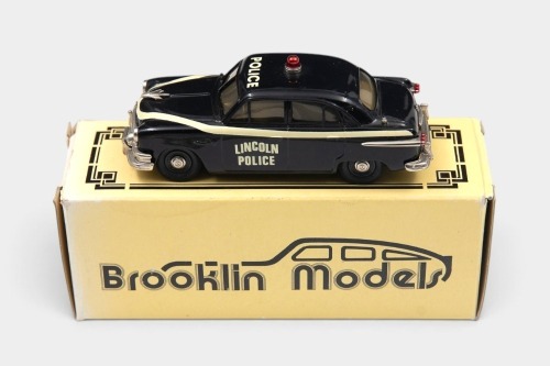 FORD: A 1:43 scale Brooklin Collection White Metal model of a 1951 Ford Fordor in Lincoln Police livery