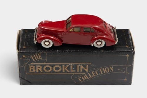 HUPMOBILE: A 1:43 scale Brooklin Collection White Metal model of a 1941 Hupmobile Model 115R Skylark Custom Touring Sedan
