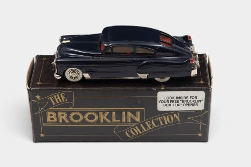 CADILLAC: A 1:43 scale Brooklin Collection White Metal model of a 1948 Cadillac Dynamic Fast Back Coupe