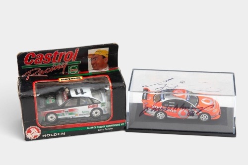 TOURING/SUPERCARS: Two 1:64 scale models, including Ford BA Falcon V8 Supercar #888 Vodafone model with case signed by Lowndes and Whincup, and a Matchbox #11 Castrol Racing VR Commodore