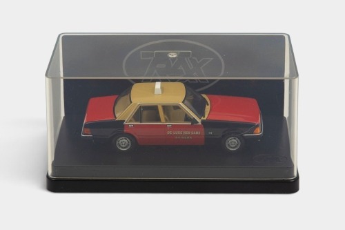 233 · XD FALCON: A Trax 1:43 scale Ford XD Falcon GL taxi model, finished in red, black and beige paintwork bearing the De-luxe Red Cabs livery, part of the Aussie taxi series collection, model number TR84C