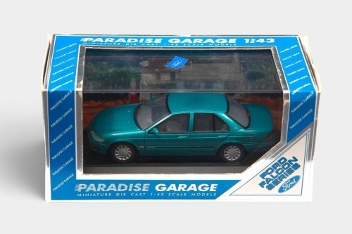 241 · FORD: A 1:43 scale model by Paradise Garage of the Ford EF Falcon Futura in Reef Green Metallic, complete with original packaging