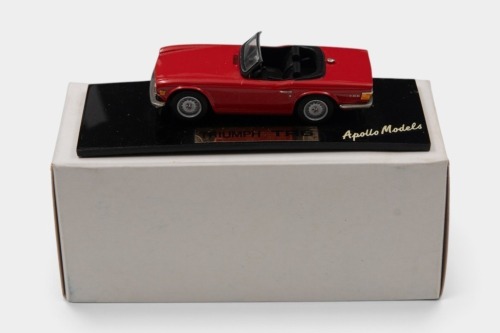 TR6: A 1:43 scale RAE/Apollo Models white metal model of a Triumph TR6 in red, model no.AP001A, model on base, with box