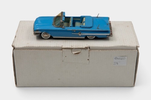 274 · CHEVROLET: A 1:43 scale hand-built white metal model by Conquest Models/SMTS of a 1960 Chevrolet Impala Convertible