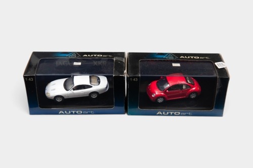 290 · AUTOART: Two 1:43 scale AUTOart models, including a Jaguar XKR coupe and a Volkswagen Beetle