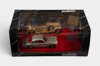 SOLIDO: A Solido Prestige 'Coffret Centenaire' box set comprising two 1:43 scale models, including a Jaguar and a Rolls-Royce