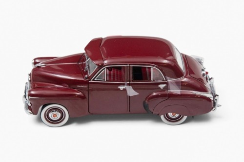 FJ HOLDEN: A 1:24 scale Trax 1953 FJ Holden Special Sedan in maroon