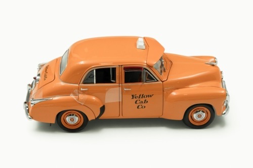 FJ HOLDEN: A 1:24 scale Trax 1953 FJ Holden Special Sedan in Taxi 'Yellow Cab' livery, in as-new condition, within box