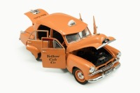 FJ HOLDEN: A 1:24 scale Trax 1953 FJ Holden Special Sedan in Taxi 'Yellow Cab' livery, in as-new condition, within box - 6