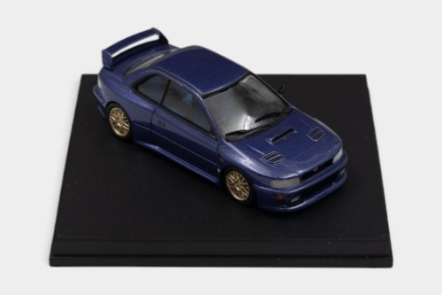 SUBARU: A 1:43 scale Trofeu model of a Subaru Impreza WRC Roadcar in metallic blue