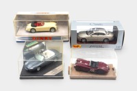 JAGUAR: Four 1:43 scale Jaguar models, including Dinky 1960 Jaguar XK150, Brumm XK120 in Mille Miglia livery, Vitesse Jaguar XK8 and a Maisto 1999 Jaguar S-Type
