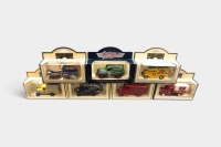 LLEDO DAYS GONE: A group of seven Lledo/Vanguards Days Gone delivery models, including Ford, Chevrolet, and Morris vans in various liveries