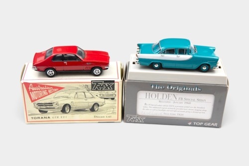 TRAX: Two 1:43 scale Trax models, TR20 a Holden FB Sedan in blue, and TR8 a Holden Torana GTR-XU1 in red