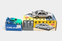 MODELS: Two scale models, including a 1:60 scale Tomica Nissan Skyline GT-R R33 in Falken livery, along with a Corgi Vanguards Ford Sierra Sapphire Cosworth 4x4 - 2