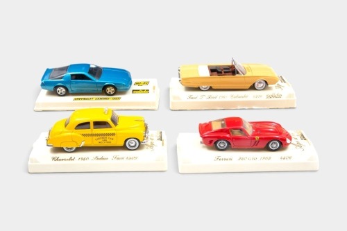 364 · SOLIDO: Four 1:43-scale Solido models, including a 1963 Ferrari 250 GTO, Chevrolet Camaro, 1961 Ford T-Bird, and a 1950 Chevrolet Sedan Taxi