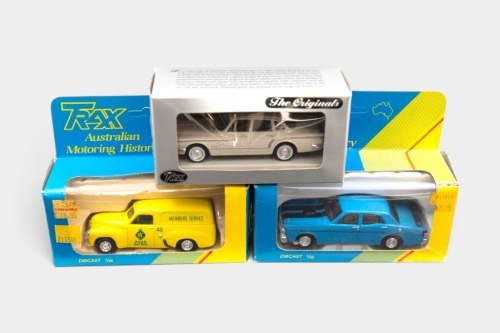 TRAX: Three 1:43 scale Trax models, including a Ford XY Falcon GTHO, an FJ Holden Van RACV Road Service livery, and a R Series Valiant