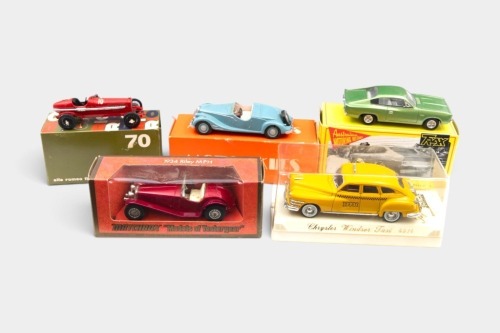 MODELS: A mixed grouping of five boxed models, including Trax Charger, Solido Chrysler Taxi, Matchbox 1934 Riley, RIO Models Alfa Romeo Tipo B, and a Motorkits 1949 Riley Roadster
