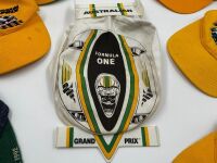 AUSTRALIAN GRAND PRIX: An Official 1980 Australian Grand Prix jacket (in used condition with a small split in the stitching and some yellowing with age) together with a collection of caps [Location: Sydney] - 13
