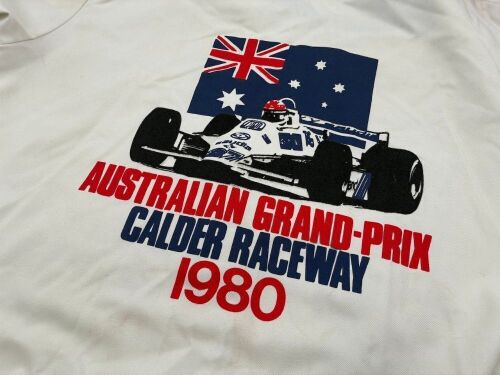 AUSTRALIAN GRAND PRIX: An Official 1980 Australian Grand Prix jacket (in used condition with a small split in the stitching and some yellowing with age) together with a collection of caps [Location: Sydney]