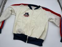 AUSTRALIAN GRAND PRIX: An Official 1980 Australian Grand Prix jacket (in used condition with a small split in the stitching and some yellowing with age) together with a collection of caps [Location: Sydney] - 3