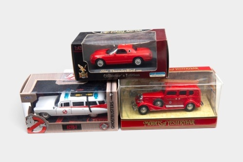 MODELS: Three mixed, approximately 1:43 scale models, including Matchbox 'Models of Yesteryear' Y61 1933 Cadillac Fire Engine, JADA Ghostbusters Ecto-1, and a Road Signatures 2000 Ford Thunderbird