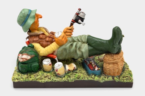 G.FORCHINO: A limited edition (No.07215) sculpture by Guillermo Forchino, titled 'The Fisherman', measures approx. 33cm wide, 45cm high, with rod attached