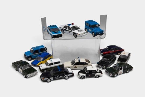 POLICE: A collection of fourteen 1:43 scale Police diecast vehicles