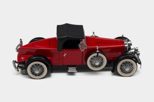 STUTZ: A 1:24 scale Franklin Mint model of a 1928 Stutz Black Hawk Boat-Tail Speedster in red
