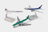 PLANES: Three diecast model planes, including a British Airways Comet, a Japan Airlines Boeing, and an Aer Lingus Ireland A380