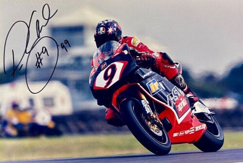 PETER GODDARD: An unframed signed original photograph by motorsport photographer John Morris [Location: Sydney]