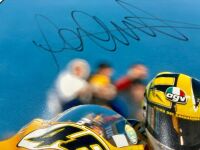 VALENTINO ROSSI: An unframed signed original photograph by motorsport photographer John Morris [Location: Sydney] - 2