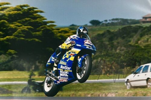 KENNY ROBERTS JR: An unframed signed original photograph by motorsport photographer John Morris [Location: Sydney]