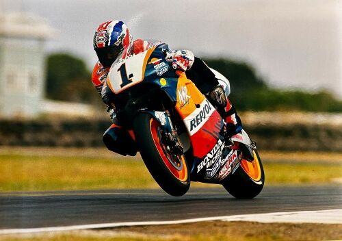 MICK DOOHAN: An unframed original photograph by motorsport photographer John Morris [Location: Sydney]