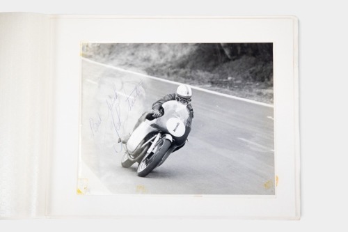 SURTEES: A photograph signed by John Surtees featuring Surtees racing MV Agusta late 1950s, 16.5cm high, 20.5cm wide [Location: Melbourne]