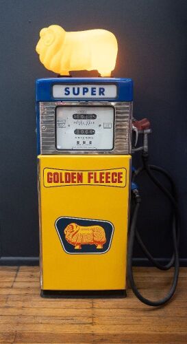 GOLDEN FLEECE: A c1970s Wayne 605 petrol pump in Golden Fleece livery, with later plastic ram, 190cm high